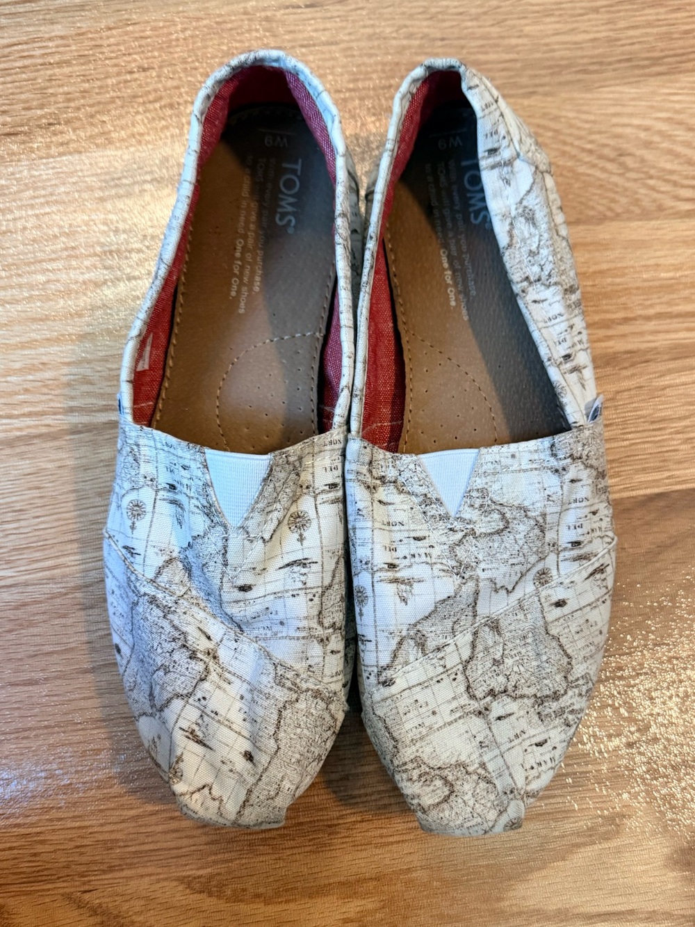 TOMS Map Print Slip-On Shoes in White and Beige